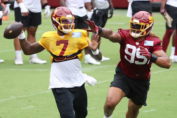 Chase Young tracking down Dwayne Haskins at Washington training camp.